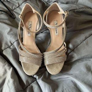 Gold strapped heals